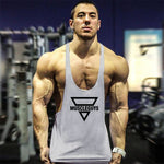 New Bodybuilding Stringer Tank Top Men Fitness Clothing Gyms Shirt Brand Muscle vest Workout Cotton Regatas Masculino